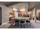 Spacious kitchen featuring an island with seating, stainless steel appliances, and ample counter space at 1379 Charles # 4, Longmont, CO 80503