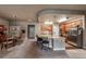 Bright and airy open kitchen with a large island, wood cabinets, and adjacent dining area at 1379 Charles # 4, Longmont, CO 80503