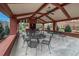 Spacious outdoor pavilion with ceiling fans, tables, and an outdoor kitchen, ideal for entertaining guests at 1379 Charles # 4, Longmont, CO 80503