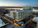 Luxury apartment building with stunning lake and mountain views at sunset at 4200 W 17Th Ave # 323, Denver, CO 80204