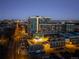 Stunning aerial view of the building at dusk showcasing its location and surrounding cityscape at 4200 W 17Th Ave # 323, Denver, CO 80204
