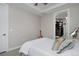 Cozy bedroom with neutral tones, a soft bed, and a peek into the walk-in closet at 4200 W 17Th Ave # 323, Denver, CO 80204