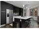 Contemporary kitchen with stainless steel appliances, sleek cabinetry, and a center island with seating at 4200 W 17Th Ave # 323, Denver, CO 80204