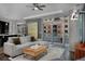 Spacious living room with hardwood floors, comfortable seating, and an open floor plan at 4200 W 17Th Ave # 323, Denver, CO 80204