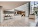 Modern lobby with marble floors, high ceilings, and a sleek reception desk at 4200 W 17Th Ave # 323, Denver, CO 80204