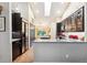 Modern kitchen featuring stainless steel appliances, granite countertops, and ample cabinet space at 19113 W 60Th Ln, Golden, CO 80403