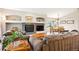 Inviting living area with hardwood floors, a fireplace, and ample seating for entertaining at 19113 W 60Th Ln, Golden, CO 80403