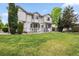 Spacious backyard featuring a well-manicured lawn and private deck at 17391 E Weaver Ave, Aurora, CO 80016