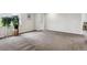 Spacious bedroom with neutral carpet, natural light, and large closet at 17391 E Weaver Ave, Aurora, CO 80016