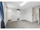 Expansive carpeted bedroom with multiple closets and a full ensuite bathroom at 17391 E Weaver Ave, Aurora, CO 80016