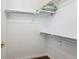Walk-in closet with adjustable shelving for optimal storage and organization at 17391 E Weaver Ave, Aurora, CO 80016