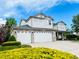 Beautiful two-story home with a three car garage and a well maintained lawn at 17391 E Weaver Ave, Aurora, CO 80016
