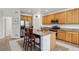 Kitchen featuring stainless steel appliances, granite countertops, and a functional kitchen island at 17391 E Weaver Ave, Aurora, CO 80016