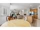 Spacious kitchen has a breakfast nook that overlooks the living room with fireplace at 17391 E Weaver Ave, Aurora, CO 80016