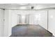 Spacious unfinished basement with painted beams, concrete flooring and exposed ceiling at 4134 Bryant St, Denver, CO 80211
