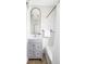 This modern bathroom features a vanity, bathtub, and shower with white subway tiles at 4134 Bryant St, Denver, CO 80211
