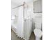 Charming bathroom featuring white subway tile, custom fixtures, and a bathtub with shower at 4134 Bryant St, Denver, CO 80211