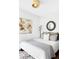 Bright bedroom featuring natural light, modern decor, and a comfortable queen bed at 4134 Bryant St, Denver, CO 80211