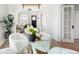 Open dining room leading to a cozy living area with modern decor at 4134 Bryant St, Denver, CO 80211