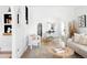 Open-concept living area with dining space and contemporary design at 4134 Bryant St, Denver, CO 80211