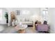 Stylish living room featuring modern furniture and bright natural light at 4134 Bryant St, Denver, CO 80211