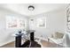Bright office space with natural light, modern desk, and hardwood floors at 4134 Bryant St, Denver, CO 80211