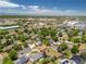 Aerial view of residential home with a large backyard and mature trees at 750 S Dearborn Ct, Aurora, CO 80012