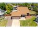 Aerial view of a well-maintained house, two-car garage and a landscaped yard at 750 S Dearborn Ct, Aurora, CO 80012