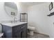 Modern bathroom with new vanity, stylish mirror, and updated fixtures at 750 S Dearborn Ct, Aurora, CO 80012