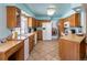 Well-equipped kitchen with tiled floor, updated cabinets, modern appliances, and a bright, functional design at 750 S Dearborn Ct, Aurora, CO 80012