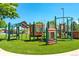 Community playground with various play structures and safety features, offering fun for children at 750 S Dearborn Ct, Aurora, CO 80012