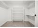 Walk-in closet with built-in shelving for optimal storage and organization at 1601 Park Ave # 506, Denver, CO 80218