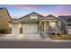 Attractive home with a three car garage and a beautiful yard, perfect for families at 2414 Leafdale Cir, Castle Rock, CO 80109