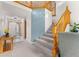 Inviting foyer features a staircase and provides an entrance to other rooms at 2292 Brantner Pl, Brighton, CO 80601