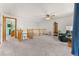 Open loft area with neutral carpet, offering a glimpse of the floor below and a cozy atmosphere at 2292 Brantner Pl, Brighton, CO 80601