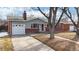 Charming single-story home with brick accents and a well-maintained front yard at 3246 S Stuart St, Denver, CO 80236