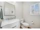 Charming bathroom features a marble countertop, modern fixtures, and a bright window at 4541 Christensen Cir, Littleton, CO 80123