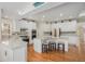 Gourmet kitchen with granite counters, stainless appliances, and center island with seating at 4541 Christensen Cir, Littleton, CO 80123