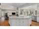 Modern kitchen with granite counters, stainless appliances, and open floor plan at 4541 Christensen Cir, Littleton, CO 80123