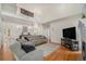 Spacious living room featuring high ceilings, wood floors, and modern design at 4541 Christensen Cir, Littleton, CO 80123