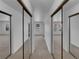 Bedroom closet with mirrored doors, neutral carpet and a glimpse of the yard at 9645 W 73Rd Pl, Arvada, CO 80005