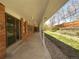 Covered patio with brick accents, providing a comfortable outdoor space at 9645 W 73Rd Pl, Arvada, CO 80005