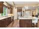 Modern kitchen with sleek stainless steel appliances, pendant lights, and ample counter space at 5091 Hidden Pond Pl, Castle Rock, CO 80108