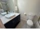 Updated bathroom featuring new vanity with vessel sink and modern fixtures at 12166 Melody Dr # 202, Denver, CO 80234