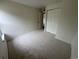 Comfortable bedroom offering plush carpeting and closet space at 12166 Melody Dr # 202, Denver, CO 80234