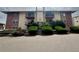 Charming building exterior with well-maintained landscaping at 12166 Melody Dr # 202, Denver, CO 80234