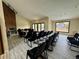 Spacious meeting room with fireplace, custom wall and an abundance of seating at 12166 Melody Dr # 202, Denver, CO 80234