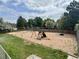 This fenced playground features a slide, swing set, tire swing and plenty of room to run around at 12166 Melody Dr # 202, Denver, CO 80234