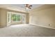 Bright bedroom with a bay window offering natural light at 6533 S Ouray St, Aurora, CO 80016