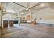 A large three car garage offers ample space for parking and storage at 6533 S Ouray St, Aurora, CO 80016